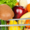 A shopping cart filled with nutritious whole foods